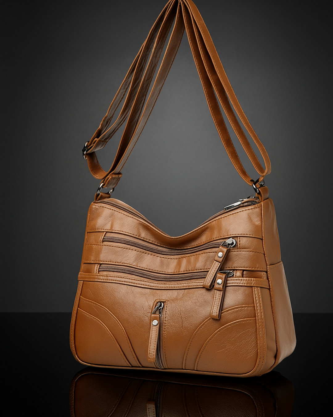 Bolso con múltiples compartimentos y textura suave®