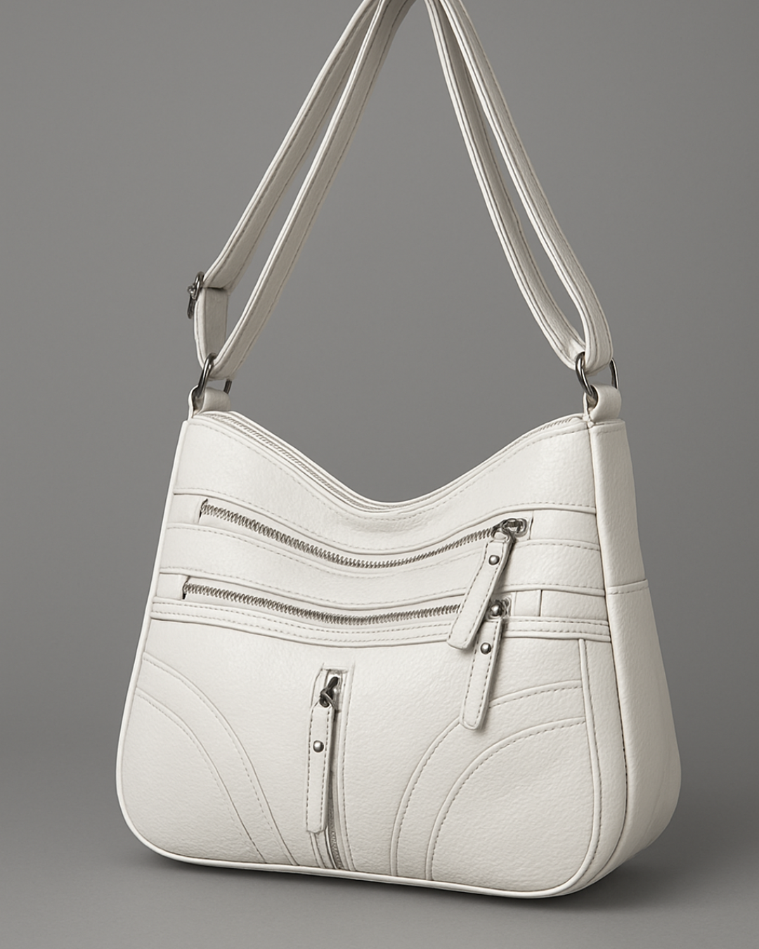 Bolso con múltiples compartimentos y textura suave®